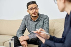 a person talking to his therapist during individual therapy