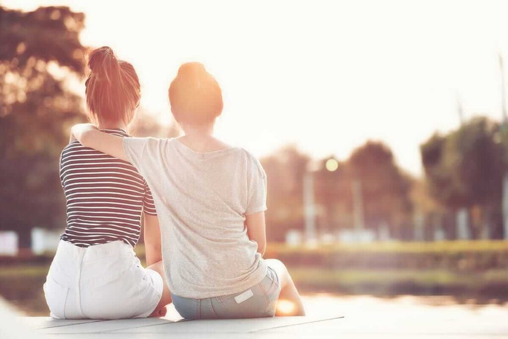 a friend provides support and harm reduction for someone battling addiction